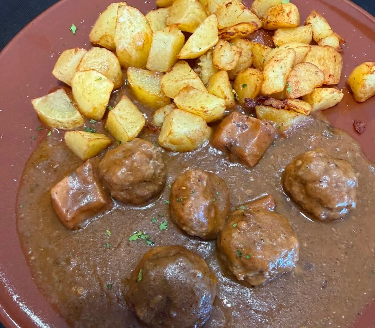 Mandonguilles amb sèpia d'un esmorzar de forquilla | Nerea Rodríguez